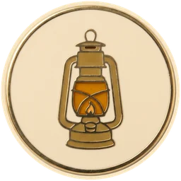An enamel pin of a lightbulb