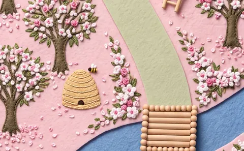 Blossom: an orchard in flower, a barn across the lane.