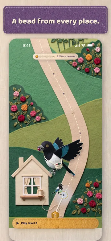 The map: Pica on a felt path through a garden, a bead from every place.